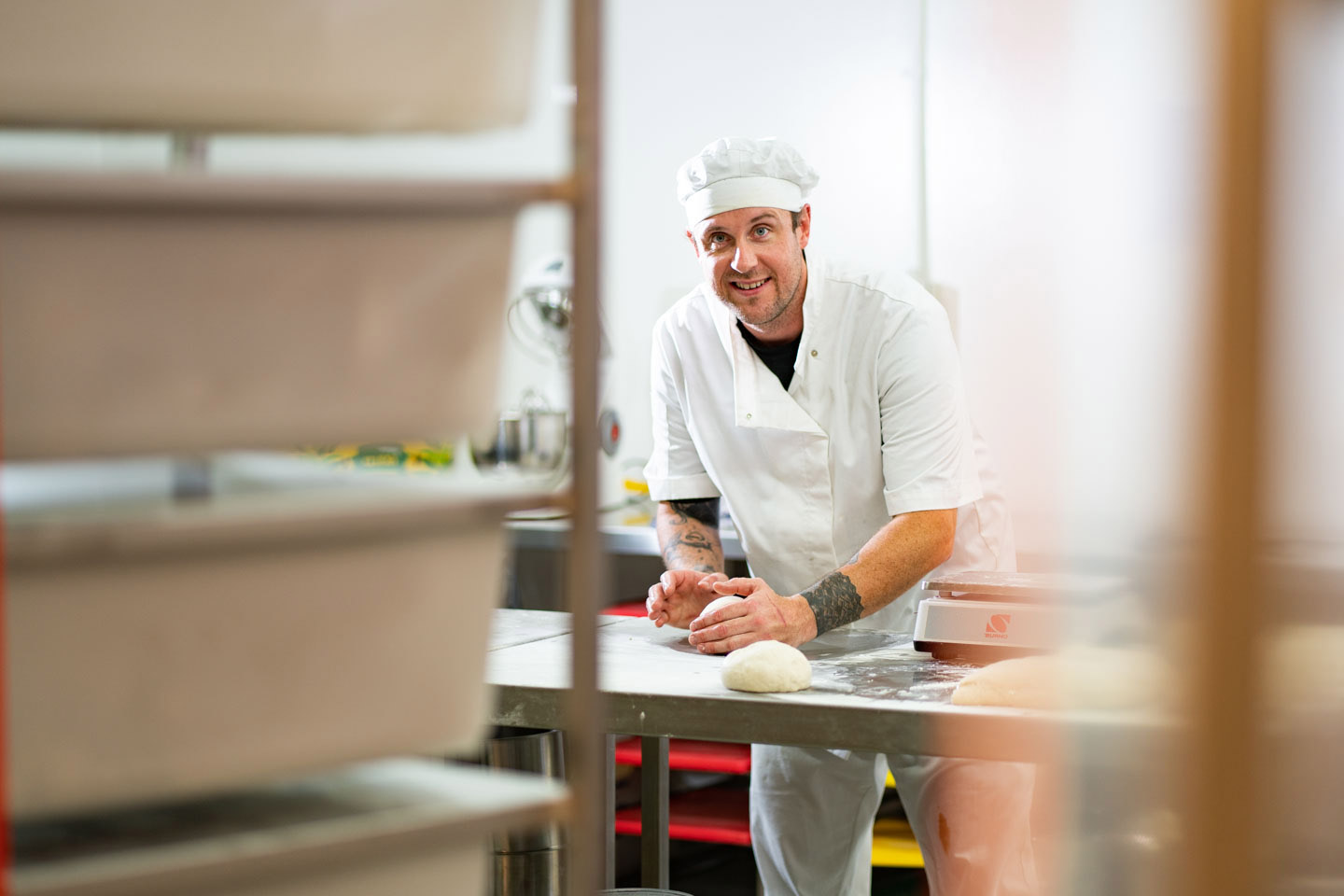 Mature-aged and male Bakery apprentice participating in hands-on training at TAFE